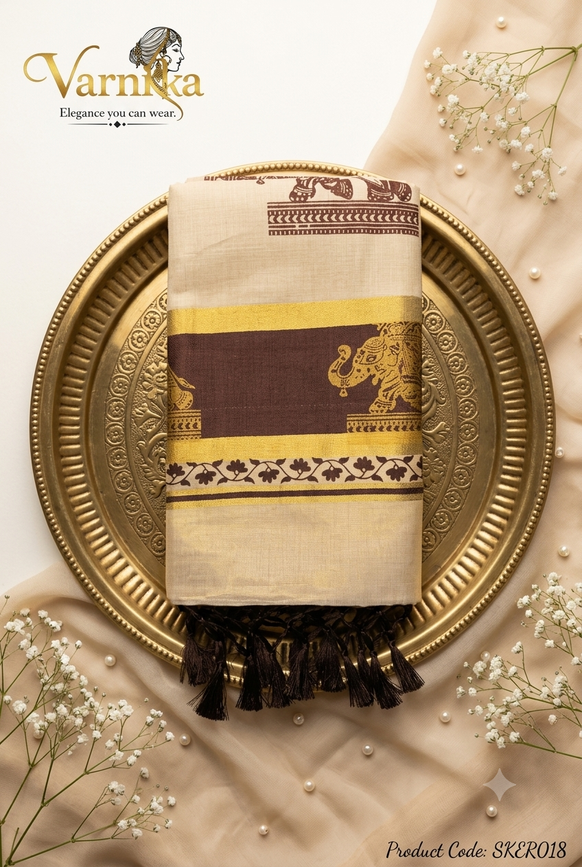 SKER018 - Golden Kerala Tissue Saree with Royal Elephant Motifs & Tassels